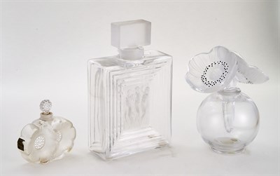 Lot 456 - Three Lalique Molded Glass Perfume Bottles...
