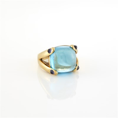 Lot 1100 - Gold, Cabochon Blue Topaz and Iolite Ring