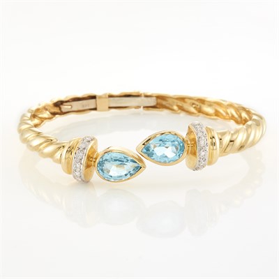 Lot 1976 - Gold, Blue Topaz and Diamond Bangle Bracelet