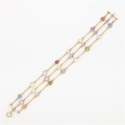 Lot 1231 - Triple Strand Gold and Gem-Set Chain Bracelet