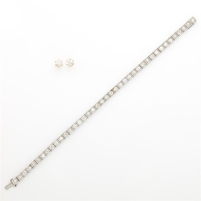 Lot 1197 - Platinum and Diamond Straightline Bracelet and Pair of Gold and Diamond Stud Earrings