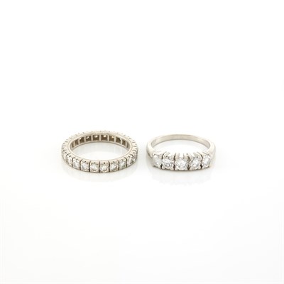 Lot 1228 - Two Platinum and Diamond Guard Rings