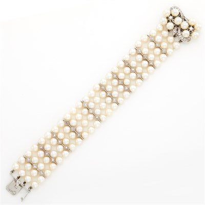 Lot 1874 - Four Strand Cultured Pearl, Diamond and White Gold Bracelet