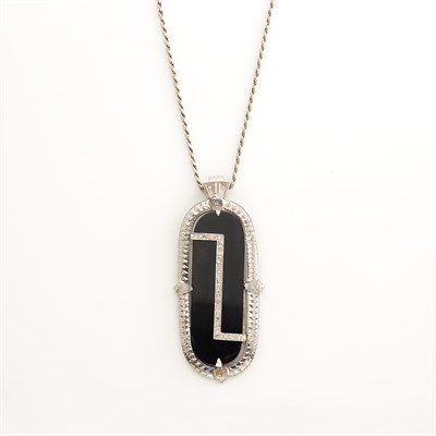 Lot 1892 - White Gold, Black Onyx and Diamond Pendant, Dagon