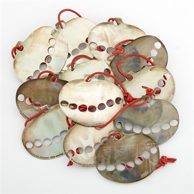 Lot 1062 - Twelve Silver Christmas Tree and Ball Ornaments, Linda Lee Johnson