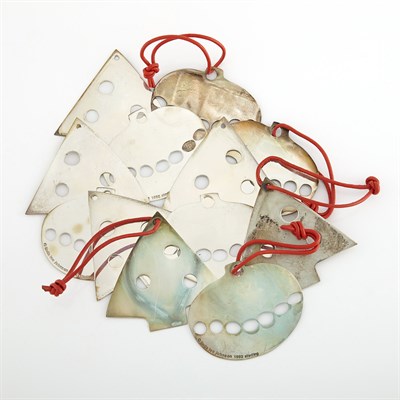 Lot 1063 - Twelve Silver Christmas Tree and Ball Ornaments, Linda Lee Johnson