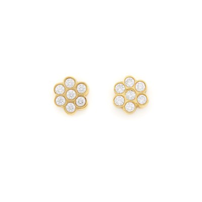 Lot 1001 - Pair of Gold and Diamond Floret Earrings