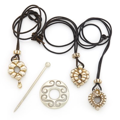 Lot 1087 - Three Silver Pendants with Cord Necklaces and Fibula Brooch, Linda Lee Johnson