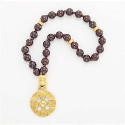 Lot 1042 - Garnet Bead and Gold Charm Bracelet, Linda Lee Johnson