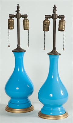 Lot 334 - Two Similar Turquoise Blue Molded Glass Lamps...