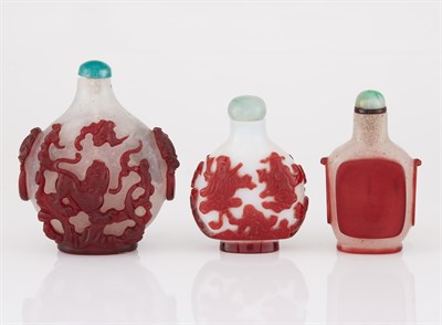 Lot 230 - Group of Three Chinese Red Overlay Snuff...