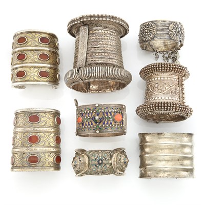 Lot 2160 - Eight Mixed Metal and Carnelian Cuff Bracelets