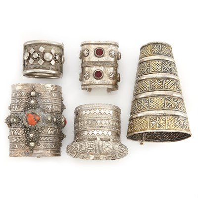 Lot 2161 - Five Mixed Metal and Coral Cuff Bracelets