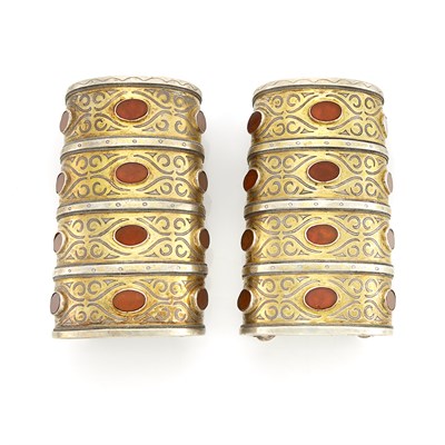 Lot 2164 - Pair of Wide Mixed Metal and Carnelian Ethnic Cuff Bracelets