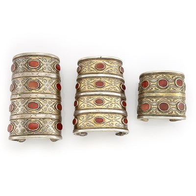Lot 2166 - Three Mixed Metal and Carnelian Cuff Bracelets
