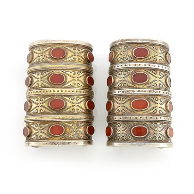 Lot 2170 - Pair of Wide Mixed Metal and Carnelian Ethnic Cuff Bracelets