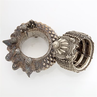 Lot 2179 - Two Oversized Silver and Metal Ethnic Bracelets