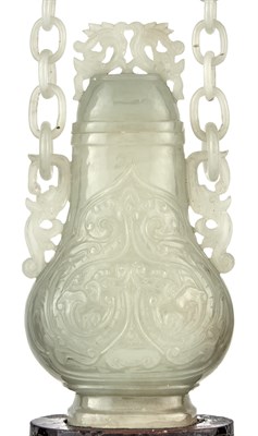 Lot 118 - Chinese White Jade Hanging Vase The pear shape...