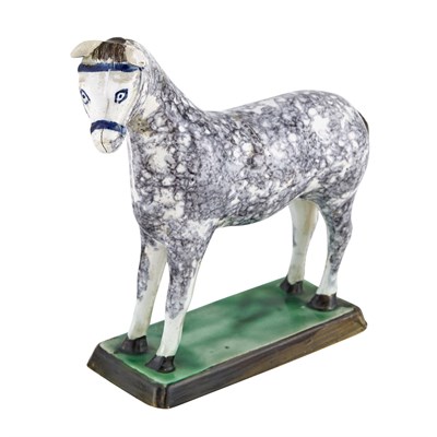 Lot 324 - Staffordshire Pearlware Figure of a Horse...