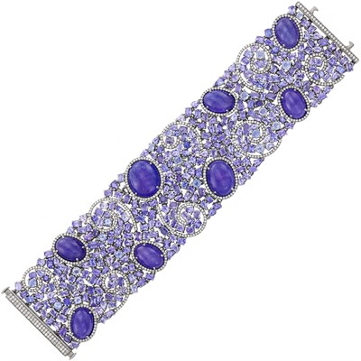 Lot 251 - Wide Blackened Gold, Cabochon Tanzanite, Tanzanite, Sapphire and Diamond Bracelet