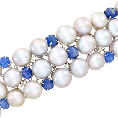 Lot 237 - Wide White Gold, Light Gray Freshwater Pearl, Star Sapphire and Diamond Bracelet