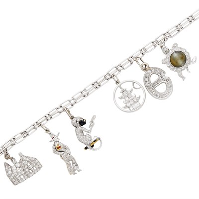 Lot 168 - White Gold, Platinum, Diamond and Gem-Set Charm Bracelet