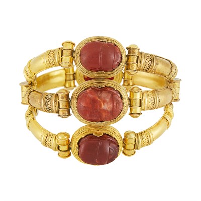 Lot 123 - Archaeological Revival Gold and Carved Agate Bracelet