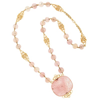 Lot 417 - Gold and Dyed Pink Quartz Bead Pendant-Necklace, Cartier, Paris