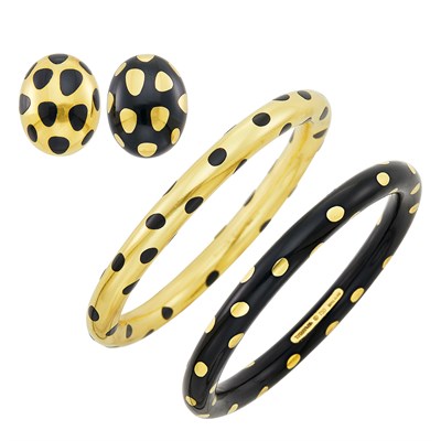 Lot 344 - Pair of Gold and Black Jade 'Positive-Negative' Earclips and Pair of Bangle Bracelets, Tiffany & Co.