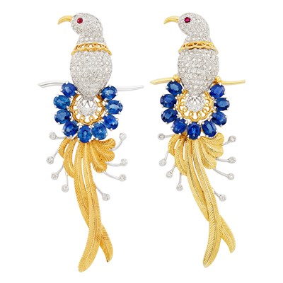Lot 567 - Pair of Two-Color Gold, Diamond and Sapphire Bird Clip-Brooches
