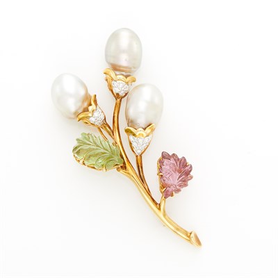 Lot 1013 - Gold, Baroque Cultured Pearl, Carved Tourmaline and Pink Tourmaline and Diamond Brooch