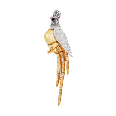 Lot 565 - Tricolor Gold, Golden Cultured Pearl, Diamond, Black Onyx and Cabochon Ruby Bird Pendant-Brooch
