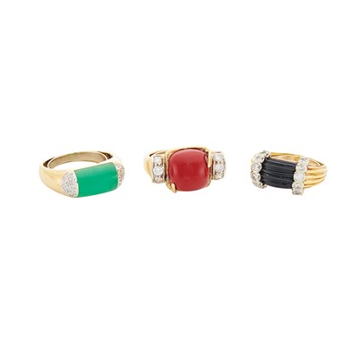 Lot 285 - Three Gold, Green and Black Onyx and Red Stone Rings