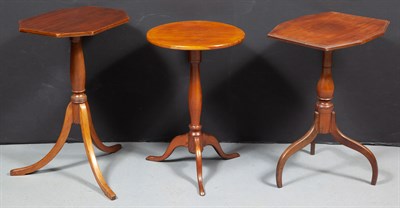 Lot 209 - Three Fruitwood and Other Wood Tripod Stands...