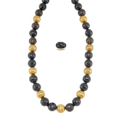 Lot 41 - Smoky Quartz Bead and Gilt-Metal Necklace and Gold and Black Onyx Ring
