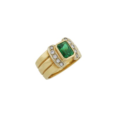 Lot 1386 - Two-Color Gold, Emerald and Diamond Ring