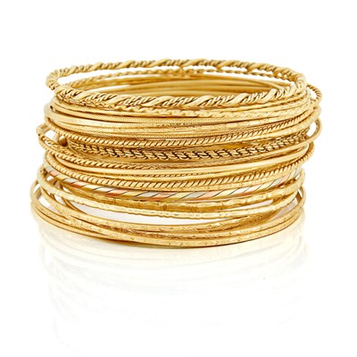 Lot 338 - Thirty-Eight Gold Bangle Bracelets