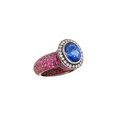 Lot 574 - Blackened White Gold, Sapphire, Ruby and Diamond Ring