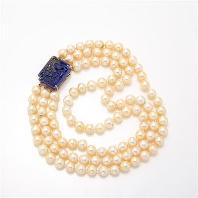 Lot 1451 - Triple Strand Cultured Pearl Necklace with Carved Lapis Clasp
