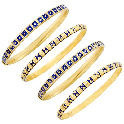Lot 124 - Four Gold, High Karat Gold and Blue Enamel Bangle Bracelets