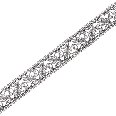 Lot 570 - Blackened Gold and Diamond Bracelet