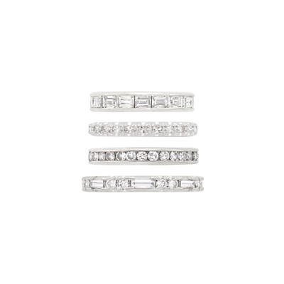 Lot 1268 - Four Platinum, White Gold and Diamond Band Rings