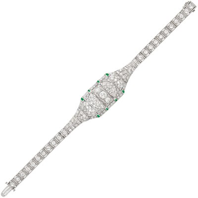 Lot 1082 - Platinum, Diamond and Emerald Bracelet