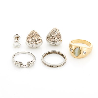 Lot 1786 - Gold, Cat's Eye Chrysoberyl and Diamond Ring Gypsy Ring and Group of White Gold. Platinum and Diamond Jewelry
