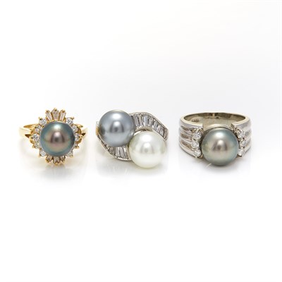 Lot 1460 - Three Yellow and White Gold, Gray and Black Cultured Pearl, Simulated Pearl, Diamond and Simulated Diamond Rings