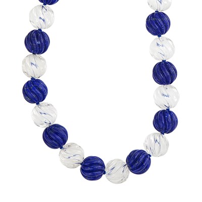 Lot 521 - Long Fluted Rock Crystal and Lapis Bead Necklace
