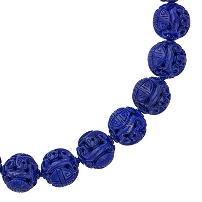Lot 143 - Carved Lapis Bead Necklace with White Gold, Lapis and Diamond Clasp