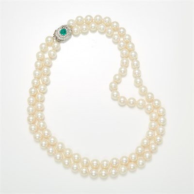 Lot 1235 - Double Strand Cultured Pearl Necklace with Platinum, Cabochon Emerald and Diamond Clasp