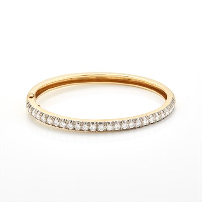 Lot 1266 - Two-Color Gold and Diamond Bangle Bracelet, Laykin