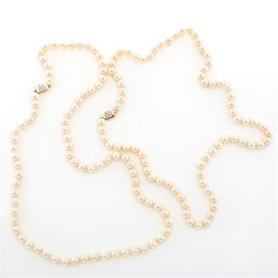 Lot 1509 - Pair of Cultured Pearl Necklaces with Gold and Diamond Clasps